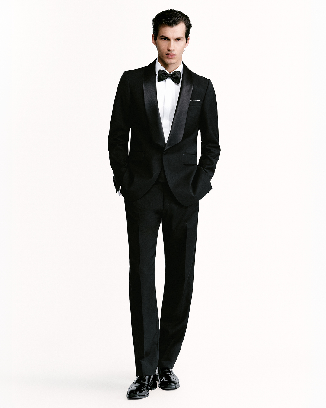 man in black tuxedo suit